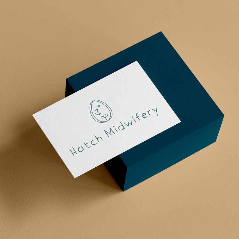 Business card mockup with Hatch Midwifery logo